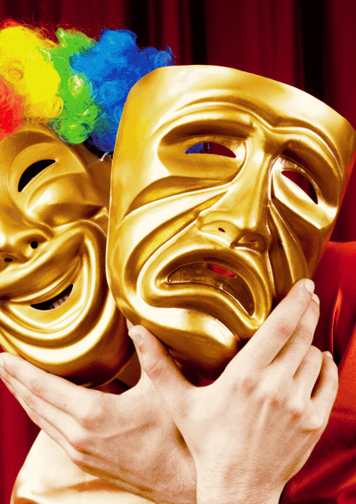 En glad og ked af det maske.